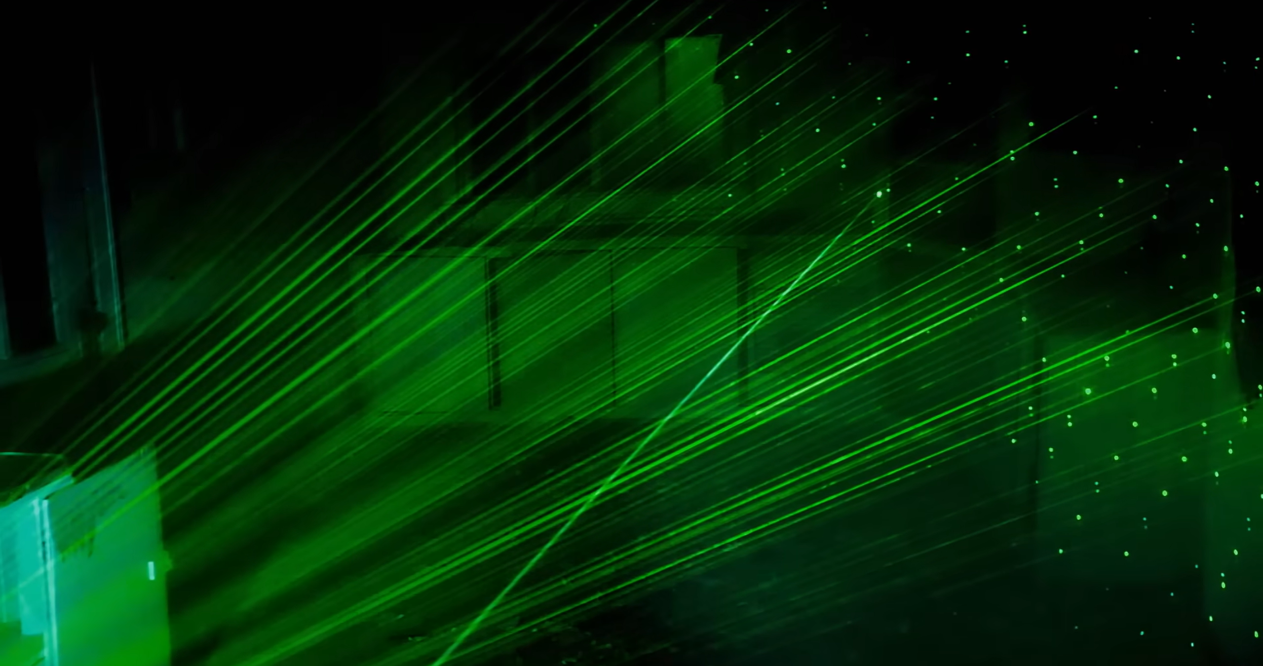 Laser beams appear early during the Homestead Three experiment.