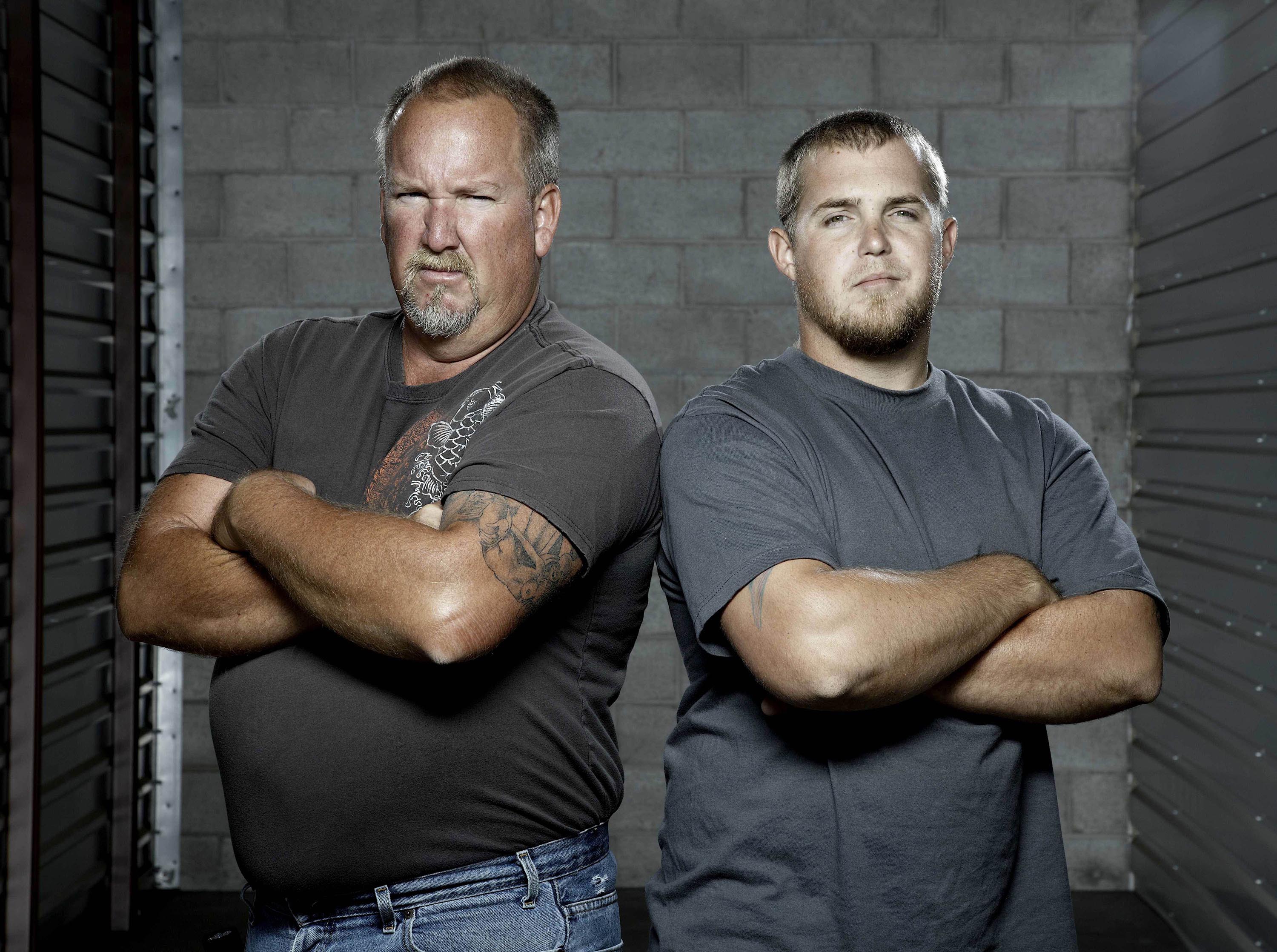 Darrell Sheets and Brandon Sheets from Storage Wars with arms crossed.