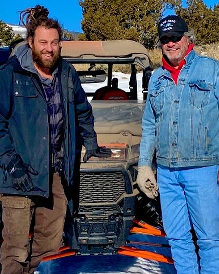 Duane and Chad Ollinger from The Blind Frog Ranch with an off-road vehicle.